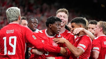 Denmark's defender #05 Patrick Dorgu (C) celebrates scoring the 1-0 opening goal during the UEFA Nations League football match League A, Group A4, Day 1, Denmark v Switzerland in the Parken stadium in Copenhagen, Denmark, on September 5, 2024. (Photo by Mads Claus Rasmussen / Ritzau Scanpix / AFP) / Denmark OUT