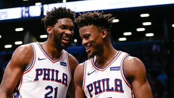 Nov 25, 2018; Brooklyn, NY, USA; Philadelphia 76ers center Joel Embiid (21) and forward Jimmy Butler (23) react in the fourth quarter against the Brooklyn Nets at Barclays Center. Mandatory Credit: Nicole Sweet-USA TODAY Sports