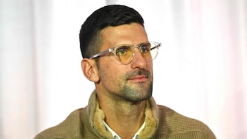 Serbian tennis player Novak Djokovic attends a press conference.