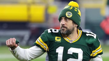 GREEN BAY, WISCONSIN - JANUARY 16: Aaron Rodgers #12 of the Green Bay Packers celebrates defeating the Los Angeles Rams 32-18 in the NFC Divisional Playoff game at Lambeau Field on January 16, 2021 in Green Bay, Wisconsin. Stacy Revere/Getty Images/AFP