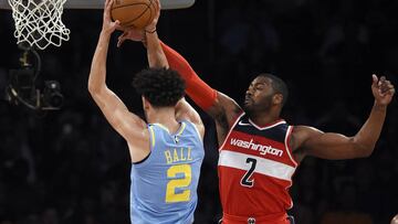 Oct 25, 2017; Los Angeles, CA, USA; Los Angeles Lakers guard Lonzo Ball (2) attempts a shot defended by Washington Wizards guard John Wall (2) during the second quarter at Staples Center. Mandatory Credit: Kelvin Kuo-USA TODAY Sports