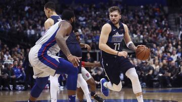 Jan 25, 2019; Dallas, TX, USA; Dallas Mavericks forward Luka Doncic (77) drives to the basket as Detroit Pistons center Andre Drummond (0) defends during the second quarter at American Airlines Center. Mandatory Credit: Kevin Jairaj-USA TODAY Sports