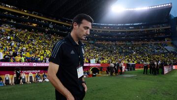 Soccer Football - World Cup - South American Qualifiers - Ecuador v Argentina - Estadio Monumental Banco Pichincha, Guayaquil, Ecuador - March 29, 2022 Argentina coach Lionel Scaloni walks out before the match Pool via REUTERS/Franklin Jacome