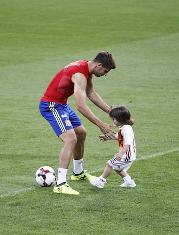Sergio Ramos looks on as son Sergio Jr nutmegs Morata.