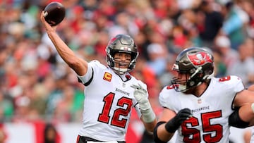 TAMPA, FLORIDA - JANUARY 16: Tom Brady #12 of the Tampa Bay Buccaneers throws a pass against the Philadelphia Eagles during the second quarter in the NFC Wild Card Playoff game at Raymond James Stadium on January 16, 2022 in Tampa, Florida.   Michael Reav