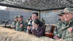 North Korean leader Kim Jong Un and his daughter Kim Ju Ae attend a demonstration during the training of the Korean People's Army's air and amphibious combat units in this picture released on March 16, 2024, by the Korean Central News Agency.  KCNA via REUTERS    ATTENTION EDITORS - THIS IMAGE WAS PROVIDED BY A THIRD PARTY. REUTERS IS UNABLE TO INDEPENDENTLY VERIFY THIS IMAGE. NO THIRD PARTY SALES. SOUTH KOREA OUT. NO COMMERCIAL OR EDITORIAL SALES IN SOUTH KOREA.