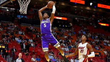 Oct 29, 2018; Miami, FL, USA; Sacramento Kings guard De&#039;Aaron Fox (5) dunks the ball past Miami Heat center Hassan Whiteside (21) during the first half at American Airlines Arena. Mandatory Credit: Steve Mitchell-USA TODAY Sports     TPX IMAGES OF THE DAY