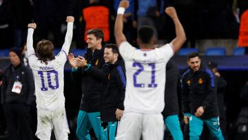 Soccer Football - Champions League - Quarter Final - Second Leg - Real Madrid v Chelsea - Santiago Bernabeu, Madrid, Spain - April 12, 2022 Real Madrid's Luka Modric and Rodrygo celebrate as Chelsea's Hakim Ziyech looks dejected after the match