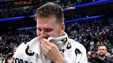 Doncic wiped his tears away before wiping the floor against his old side.