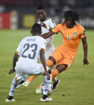 Gervinho y Harrison Afful.