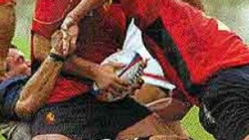 <b>PALIZA.</B> Los norteamericanos aseguraron su billete para Australia.