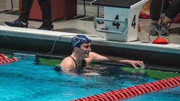 Penn University�s transgender swimmer Lia Thomas smiles after finishing first place in the 500 yard freestyle race with a time 4.41.19, during the preliminary swim races in heat five during the Women's Ivy League Swimming & Diving Championships at Harvard University in Cambridge, Massachusetts on February 17, 2022. (Photo by Joseph Prezioso / AFP)