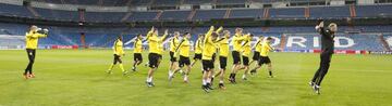 Borussia Dortmund train at the Santiago Bernabéu ahead of their Champions League match against Real Madrid.