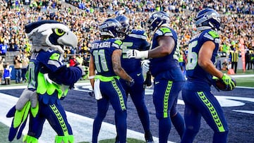 SEATTLE, WASHINGTON - DECEMBER 31: Jaxon Smith-Njigba #11 of the Seattle Seahawks celebrates a second quarter touchdown with teammates during a game against the Pittsburgh Steelers at Lumen Field on December 31, 2023 in Seattle, Washington. Jane Gershovich/Getty Images/AFP (Photo by Jane Gershovich / GETTY IMAGES NORTH AMERICA / Getty Images via AFP)