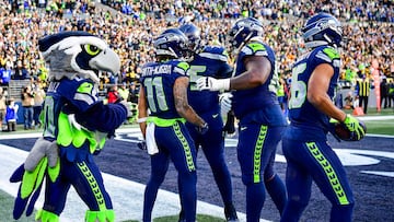 SEATTLE, WASHINGTON - DECEMBER 31: Jaxon Smith-Njigba #11 of the Seattle Seahawks celebrates a second quarter touchdown with teammates during a game against the Pittsburgh Steelers at Lumen Field on December 31, 2023 in Seattle, Washington.   Jane Gershovich/Getty Images/AFP (Photo by Jane Gershovich / GETTY IMAGES NORTH AMERICA / Getty Images via AFP)