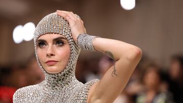 Cara Delevingne poses at the Met Gala, an annual fundraising gala held for the benefit of the Metropolitan Museum of Art's Costume Institute with this year's theme 'Sleeping Beauties: Reawakening Fashion' in New York City, New York, U.S., May 6, 2024. REUTERS/Andrew Kelly