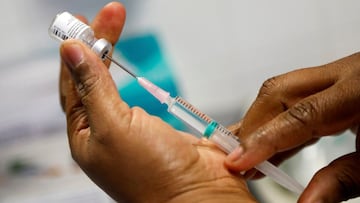 A nurse prepares a dose of the Pfizer-BioNTech COVID-19 vaccine at the Hector Berlioz EHPAD (care homes and day centres for elderly people) as France begins vaccination against the coronavirus disease (COVID-19) in Bobigny, France, December 30, 2020. REUTERS/Charles Platiau