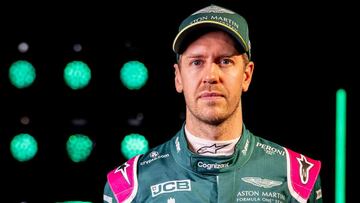 A handout photograph released by Aston Martin Cognizant Formula One Team on March 3, 2021 shows German driver Sebastian Vettel posing in front of the AMR21, their new car for the 2021 Formula One season, during a virtual launch event at their headquarters in Gaydon, central England. (Photo by Glenn Dunbar / ASTON MARTIN / AFP) / RESTRICTED TO EDITORIAL USE - MANDATORY CREDIT &quot;AFP PHOTO / ASTON MARTIN / GLENN DUNBAR&quot; - NO MARKETING - NO ADVERTISING CAMPAIGNS - DISTRIBUTED AS A SERVICE TO CLIENTS