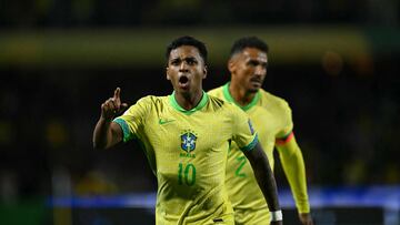 Brazil's forward Rodrygo celebrates after scoring during the 2026 FIFA World Cup South American qualifiers football match between Brazil and Ecuador, at the Major Ant�nio Couto Pereira stadium in Curitiba, Brazil, on September 6, 2024. (Photo by Mauro PIMENTEL / AFP)