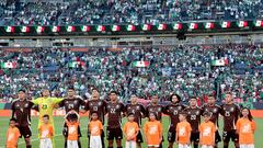 DENVER, COLORADO - JUNE 05: Team Mexico stands for their national anthem before their match against Uruguay during an international friendly match between Mexico and Uruguay at Empower Field At Mile High on June 05, 2024 in Denver, Colorado.   Matthew Stockman/Getty Images/AFP (Photo by MATTHEW STOCKMAN / GETTY IMAGES NORTH AMERICA / Getty Images via AFP)