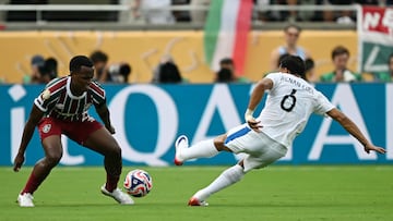 Fluminense's Colombian midfielder #21 Jhon Arias and Al Hilal's Brazilian defender #06 Renan Lodi fight for the ball during the FIFA Club World Cup 2025 quarterfinal football match between Brazil's Fluminense and Saudi Arabia's Al-Hilal at the Camping World Stadium in Orlando on July 4, 2025. (Photo by CHANDAN KHANNA / AFP) (Photo by CHANDAN KHANNA/AFP via Getty Images)