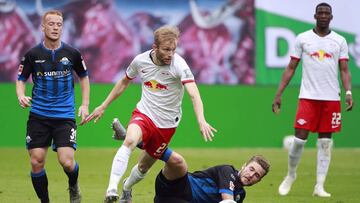 LEIPZIG, GERMANY - JUNE 06: Konrad Laimer of RB Leipzig takes on Dennis Srbeny of SC Paderborn during the Bundesliga match between RB Leipzig and SC Paderborn 07 at Red Bull Arena on June 6, 2020 in Leipzig, Germany. (Photo by Hannibal Hanschke/Pool via G