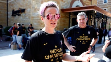 Soccer Football - Women&#039;s World Cup - United States leave Lyon after winning the World Cup - Fourviere Hotel, Lyon, France - July 8, 2019  Megan Rapinoe of the U.S. talks to reporters before leaving the hotel to return to the United States after winn