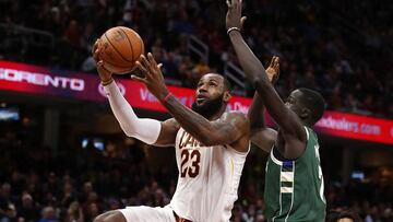 CLEVELAND, OH - NOVEMBER 07: LeBron James #23 of the Cleveland Cavaliers drives past Thon Maker #7 of the Milwaukee Bucks during the second half at Quicken Loans Arena on November 7, 2017 in Cleveland, Ohio. Cleveland won the game 124-119. NOTE TO USER: U