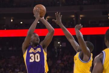 Julius Randle y Draymond Green.