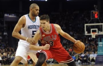 Doug McDermott y Nicolas Batum.