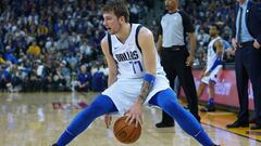 OAKLAND, CA - MARCH 23:  Luka Doncic #77 of the Dallas Mavericks dribbles the ball against the Golden State Warriors during an NBA basketball game at ORACLE Arena on March 23, 2019 in Oakland, California. NOTE TO USER: User expressly acknowledges and agrees that, by downloading and or using this photograph, User is consenting to the terms and conditions of the Getty Images License Agreement.  (Photo by Thearon W. Henderson/Getty Images)