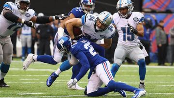 EAST RUTHERFORD, NJ - DECEMBER 18: Zach Zenner #34 of the Detroit Lions is tackled by Leon Hall #25 of the New York Giants in the first half at MetLife Stadium on December 18, 2016 in East Rutherford, New Jersey. Al Bello/Getty Images/AFP
== FOR NEWSPAPERS, INTERNET, TELCOS & TELEVISION USE ONLY ==