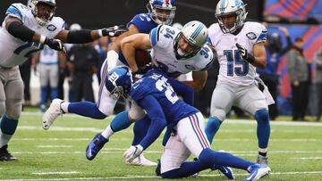 EAST RUTHERFORD, NJ - DECEMBER 18: Zach Zenner #34 of the Detroit Lions is tackled by Leon Hall #25 of the New York Giants in the first half at MetLife Stadium on December 18, 2016 in East Rutherford, New Jersey.   Al Bello/Getty Images/AFP
 == FOR NEWSPAPERS, INTERNET, TELCOS &amp; TELEVISION USE ONLY ==