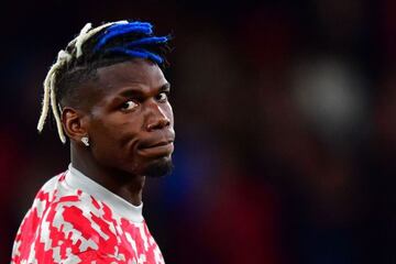 Manchester United's French midfielder Paul Pogba warms up ahead of the UEFA Champions league group F football match against Villarreal.