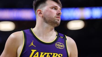 LOS ANGELES, CALIFORNIA - FEBRUARY 25: Luka Doncic #77 of the Los Angeles Lakers looks on during the first half of a game against the Dallas Mavericks at Crypto.com Arena on February 25, 2025 in Los Angeles, California. Sean M. Haffey/Getty Images/AFP (Photo by Sean M. Haffey / GETTY IMAGES NORTH AMERICA / Getty Images via AFP)