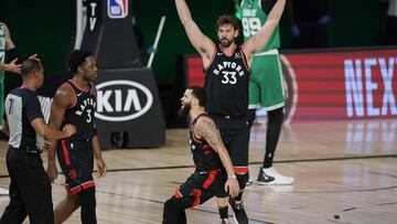 Toronto Raptors&#039; Fred VanVleet, center, and Marc Gasol (33) celebrate with OG Anunoby (3) after Anunoby hit the game winning shot over the Boston Celtics during an NBA conference semifinal playoff basketball game Thursday, Sept. 3, 2020, in Lake Buena Vista, Fla. (AP Photo/Mark J. Terrill)