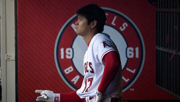 ANAHEIM, CALIFORNIA - AUGUST 23: Designated hitter Shohei Ohtani #17 of the Los Angeles Angels looks on in the dugout before the start of game two of a doubleheader against Cincinnati Reds at Angel Stadium of Anaheim on August 23, 2023 in Anaheim, California. Kevork Djansezian/Getty Images/AFP (Photo by KEVORK DJANSEZIAN / GETTY IMAGES NORTH AMERICA / Getty Images via AFP)