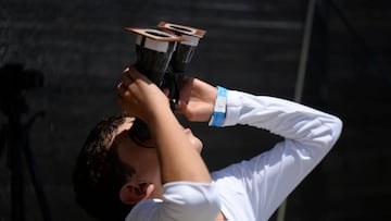 A youngster observes the solar eclipse in Neiva, Colombia, October 14, 2023. REUTERS/Vannessa Jimenez