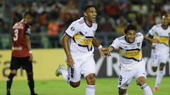 Ramon Abila of Argentina&#039;s Boca Juniors, left, celebrates with teammate Javier Obando scoring the opening goal during a Copa Libertadores Group H soccer match against Venezuela&#039;s Caracas FC in Caracas, Venezuela, Tuesday, March 3, 2020. (AP Phot