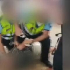 Madrid police take down mask dodging rail passenger