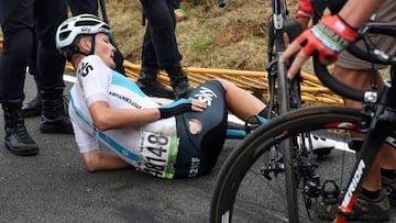 Team Sky's Dutch cyclist Dylan Van Baarle lies on the pavement following a crash after crossing the finish line of the 12th stage of the 73rd edition of "La Vuelta" Tour of Spain cycling race, a 181.1km route from Mondonedo to MaxF1on, on September 6, 2018. (Photo by MIGUEL RIOPA / AFP)