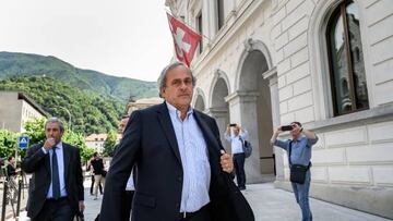 Former UEFA president Michel Platini leaves Switzerland's Federal Criminal Court after the first day of his trial over a suspected fraudulent payment, in the southern Switzerland city of Bellinzona.