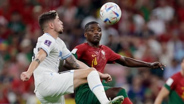 LUSAIL, QATAR - NOVEMBER 28: (L-R) Fede Valverde of Uruguay, William Carvalho of Portugal  during the  World Cup match between Portugal  v Uruguay at the Lusail Stadium on November 28, 2022 in Lusail Qatar (Photo by Eric Verhoeven/Soccrates/Getty Images)