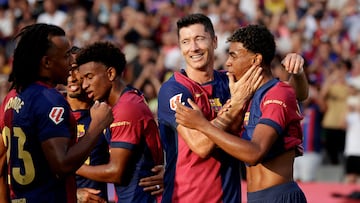 BARCELONA, SPAIN - AUGUST 24: Lamine Yamal of FC Barcelona celebrates 1-0 with Raphinha of FC Barcelona, Alejandro Balde of FC Barcelona, Robert Lewandowski of FC Barcelona, Jules Kounde of FC Barcelona during the LaLiga EA Sports match between FC Barcelona v Athletic de Bilbao at the Lluis Companys Olympic Stadium on August 24, 2024 in Barcelona Spain (Photo by Rico Brouwer/Soccrates/Getty Images)