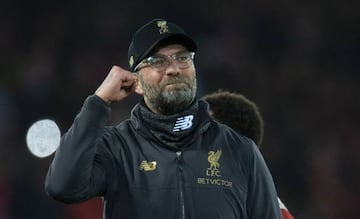 Liverpool's manager Juergen Klopp reacts after winning the English Premier League soccer match between Liverpool and Arsenal