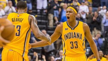 Apr 4, 2017; Indianapolis, IN, USA; Indiana Pacers forward Paul George (13) celebrates a three point basket and a lead over the Toronto Raptors with teammate center Myles Turner (33) the game at Bankers Life Fieldhouse. The Pacers beat the Raptors 108-90. Mandatory Credit: Trevor Ruszkowski-USA TODAY Sports