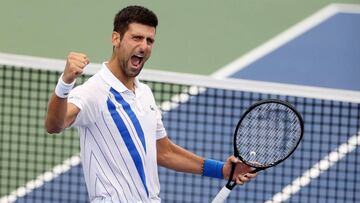 (FILES) In this file photo Novak Djokovic of Serbia celebrates his win over Milos Raonic of Canada in the men's singles final of the Western & Southern Open at the USTA Billie Jean King National Tennis Center on August 29, 2020 in the Queens borough of New York City. - Overwhelming favorite Novak Djokovic begins his quest for an 18th Grand Slam title on August 31, 2020 as a unique, spectator-free 2020 US Open gets underway in a COVID-19 quarantine bubble at Flushing Meadows. The world number one headlines the opening day of a tennis major that promises to be unlike any other and which is missing several top players due to coronavirus fears. (Photo by MATTHEW STOCKMAN / GETTY IMAGES NORTH AMERICA / AFP)