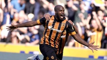 Hull City's Oscar Estupinan celebrates scoring their side's second goal of the game with team-mate Allahyar Sayyadmanesh during the Sky Bet Championship match at the MKM Stadium, Hull. Picture date: Saturday August 13, 2022. (Photo by Richard Sellers/PA Images via Getty Images)