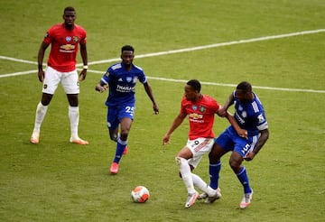 LEICESTER, ENGLAND - JULY 26: Anthony Martial of Manchester United is challenged by Wes Morgan of Leicester City during the Premier League match between Leicester City and Manchester United at The King Power Stadium on July 26, 2020 in Leicester, England