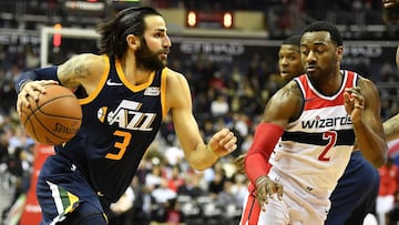 Ricky Rubio penetra ante la defensa de John Wall.